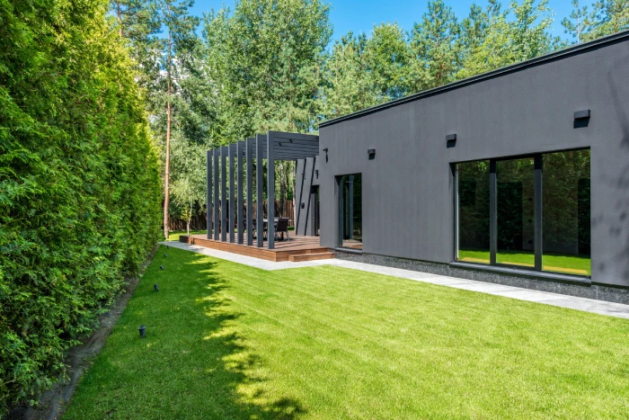 Landscaped garden with lush lawn and borders
